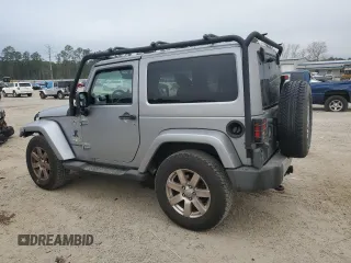 2015 Jeep Wrangler Sahara with VIN 1C4AJWBG8FL651169, listed as a Copart auction lot 44468995 with 119,419 mi miles and Salvage title. Bid and sale history available at DreamBid. Image 2.