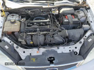 2007 Ford Focus S z VIN 1FAHP34N07W331020, wystawiony jako Copart lot #45483515 z przebiegiem 80 981 mil mil oraz Czysty tytuł • Clean title. Historia ofert i sprzedaży dostępna na DreamBid. Obrazek 11.