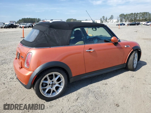 2006 MINI Convertible S with VIN WMWRH33576TF89127, listed as a Copart auction lot 49763365 with 150,446 mi miles and Salvage title. Bid and sale history available at DreamBid. Image 3.