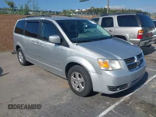 2009 Dodge Grand Caravan SXT z VIN 2D8HN54199R519668, wystawiony jako IAAI lot #42141164 z przebiegiem 137 448 mil mil oraz . Historia ofert i sprzedaży dostępna na DreamBid. Obrazek 1.