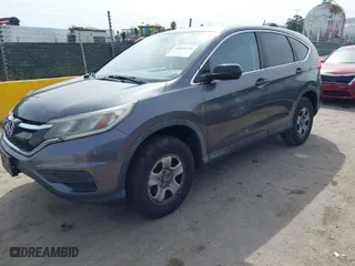 2015 Honda CR-V LX with VIN 3CZRM3H32FG702573, listed as a IAAI auction lot 41824116 with 266,847 mi miles. Bid and sale history available at carsss.com. Image 2.