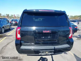 2017 GMC Yukon XL SLT with VIN 1GKS1GKCXHR255241, listed as a IAAI auction lot 40993149 with 173,130 mi miles. Bid and sale history available at carsss.com. Image 16.