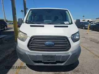 2017 Ford Transit Cargo with VIN 1FTYR2ZM3HKA61367, listed as a IAAI auction lot 42090311 with 111,998 mi miles. Bid and sale history available at carsss.com. Image 1.
