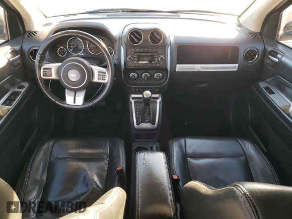 2015 Jeep Compass High Altitude Edition with VIN 1C4NJDEB4FD216777, listed as a Copart auction lot 79407354 with 164,501 mi miles and Salvage Title. Bid and sale history available at carsss.com. Image 8.