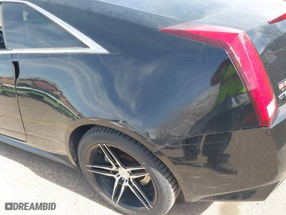 2012 Cadillac CTS Coupe with VIN 1G6DC1E33C0158695, listed as a IAAI auction lot 41752295 with 150,887 mi miles. Bid and sale history available at carsss.com. Image 6.