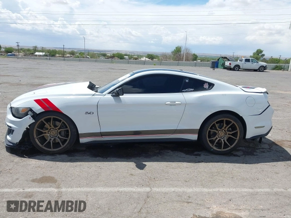 2016 Ford Mustang GT with VIN 1FA6P8CFXG5299021, listed as a IAAI auction lot 42182362 with 129,709 mi miles and . Bid and sale history available at DreamBid. Image 14.
