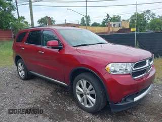 2013 Dodge Durango Crew with VIN 1C4RDJDGXDC614275, listed as a IAAI auction lot 42595022 with 171,260 mi miles and . Bid and sale history available at DreamBid. Image 1.