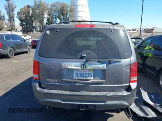 2014 Honda Pilot EX-L with VIN 5FNYF3H52EB015806, listed as a IAAI auction lot 41676586 with 193,215 mi miles and . Bid and sale history available at carsss.com. Image 17.