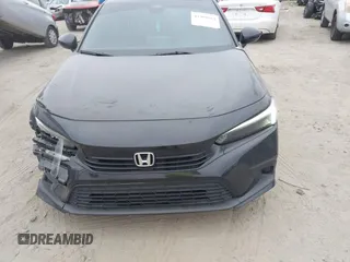 2024 Honda Civic Sport with VIN 2HGFE2F51RH594148, listed as a IAAI auction lot 41304184 with 11,307 mi miles and . Bid and sale history available at DreamBid. Image 12.