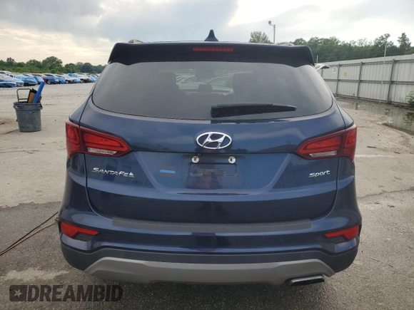 2018 Hyundai Santa Fe 2.4L z VIN 5XYZU3LB2JG537457, wystawiony jako Copart lot #56800005 z przebiegiem 97 344 mil mil oraz Szkoda całkowita • Salvage title. Historia ofert i sprzedaży dostępna na DreamBid. Obrazek 6.