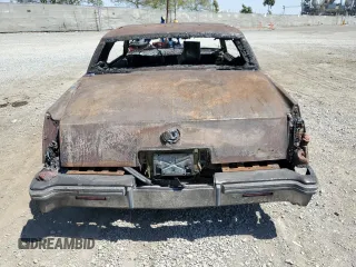 1979 Cadillac Eldorado z VIN 6L57B9E638130, wystawiony jako Copart lot #56873134 z przebiegiem Nie podano mil oraz Nie do naprawy • Non repairable. Historia ofert i sprzedaży dostępna na DreamBid. Obrazek 6.