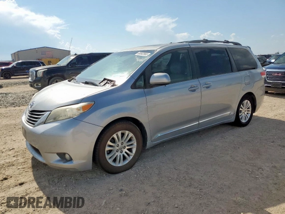 2012 Toyota Sienna XLE AAS with VIN 5TDYK3DC5CS262097, listed as a Copart auction lot 60682995 with 227,361 mi miles and Clean title. Bid and sale history available at DreamBid. Image 1.