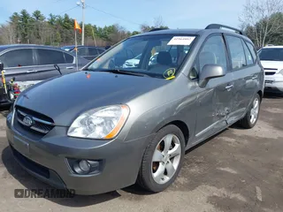 2009 Kia Rondo LX with VIN KNAFG526697274941, listed as a IAAI auction lot 41964802 with 180,941 mi miles. Bid and sale history available at carsss.com. Image 2.