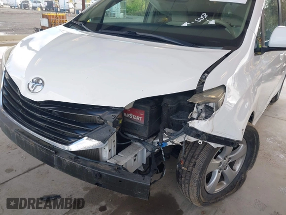 2014 Toyota Sienna LE AAS with VIN 5TDKK3DC4ES505293, listed as a IAAI auction lot 42021409 with 70,319 mi miles. Bid and sale history available at carsss.com. Image 6.