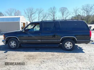 1999 Chevrolet Suburban with VIN 3GNEC16R0XG137834, listed as a IAAI auction lot 41853492 with 296,147 mi miles. Bid and sale history available at carsss.com. Image 14.