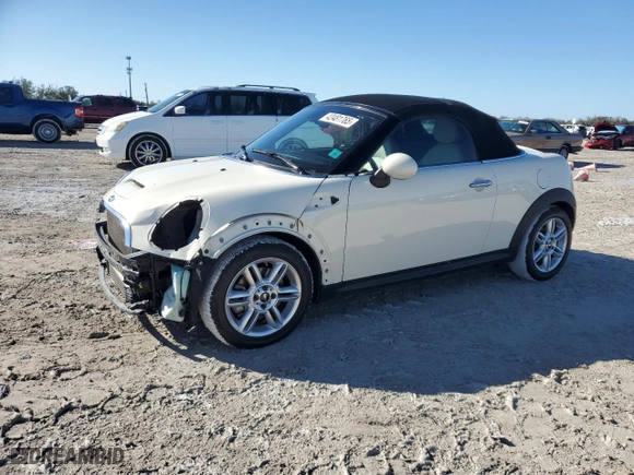 2014 MINI Cooper Roadster S with VIN WMWSY3C50ET594683, listed as a Copart auction lot 42481765 with 51,573 mi miles and Salvage Title. Bid and sale history available at carsss.com. Image 1.