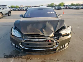 2013 Tesla Model S with VIN 5YJSA1CG0DFP15615, listed as a Copart auction lot 50795235 with 156,030 mi miles and Salvage title. Bid and sale history available at DreamBid. Image 5.