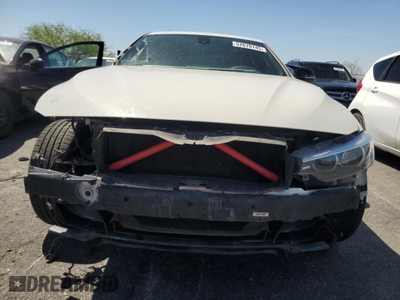 2019 BMW 4 Series 430i xDrive with VIN WBA4J3C58KBL07332, listed as a Copart auction lot 57670745 with 84,782 mi miles and Salvage title. Bid and sale history available at DreamBid. Image 5.