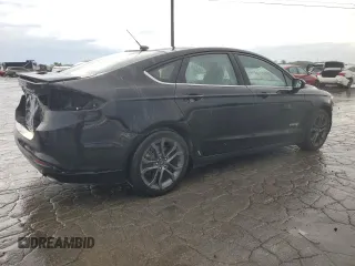 2018 Ford Fusion SE z VIN 3FA6P0LU9JR185726, wystawiony jako Copart lot #55471585 z przebiegiem 76 651 mil mil oraz Szkoda całkowita • Salvage title. Historia ofert i sprzedaży dostępna na DreamBid. Obrazek 3.