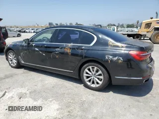 2018 BMW 7 Series 740i xDrive with VIN WBA7E4C57JGV23763, listed as a Copart auction lot 67151864 with 173,803 mi miles and Clean Title. Bid and sale history available at carsss.com. Image 2.