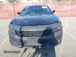 2015 Dodge Charger SXT with VIN 2C3CDXHG9FH915191, listed as a IAAI auction lot 41850427 with 164,535 mi miles and . Bid and sale history available at DreamBid. Image 6.