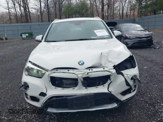 2018 BMW X1 xDrive28i with VIN WBXHT3C36J5L32162, listed as a IAAI auction lot 41802315 with 80,422 mi miles. Bid and sale history available at carsss.com. Image 12.