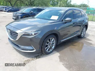 2016 Mazda CX-9 Signature with VIN JM3TCBEY9G0100579, listed as a IAAI auction lot 42282293 with 142,700 mi miles and . Bid and sale history available at DreamBid. Image 17.