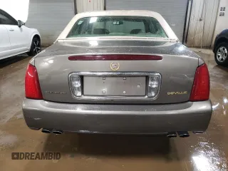 2003 Cadillac DeVille with VIN 1G6KD54Y43U124198, listed as a Copart auction lot 44515215 with 116,006 mi miles and Salvage Title. Bid and sale history available at carsss.com. Image 6.