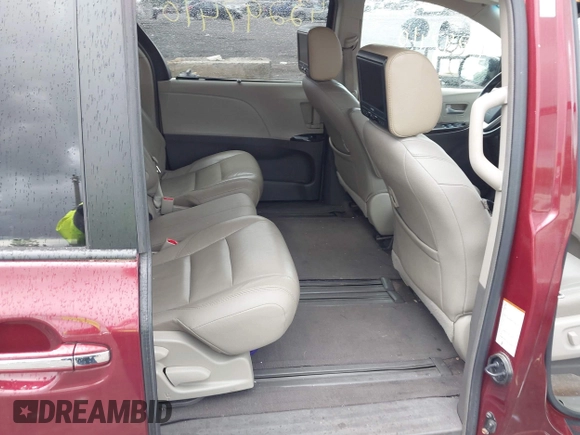 2015 Toyota Sienna XLE with VIN 5TDYK3DC9FS569714, listed as a IAAI auction lot 42297410 with 114,802 mi miles and . Bid and sale history available at DreamBid. Image 8.
