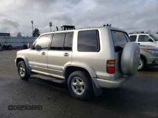 1998 Isuzu Trooper S with VIN JACDJ58X2W7904783, listed as a Copart auction lot 86781754 with 175,643 mi miles and Clean title. Bid and sale history available at DreamBid. Image 2.