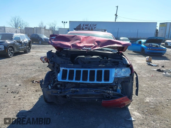 2012 Jeep Grand Cherokee Laredo with VIN 1C4RJFAG4CC297151, listed as a IAAI auction lot 41903618 with 222,357 mi miles. Bid and sale history available at carsss.com. Image 6.