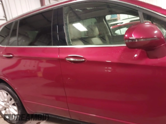 2019 Buick Envision Premium with VIN LRBFX3SX2KD145505, listed as a IAAI auction lot 41293870 with 80,130 mi miles and . Bid and sale history available at DreamBid. Image 13.
