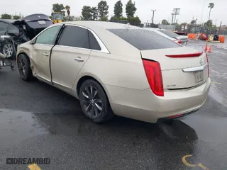 2013 Cadillac XTS with VIN 2G61N5S32D9127146, listed as a IAAI auction lot 41578528 with 98,529 mi miles. Bid and sale history available at carsss.com. Image 3.