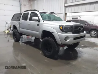 2011 Toyota Tacoma with VIN 3TMLU4EN9BM070836, listed as a IAAI auction lot 41668595 with 89,879 mi miles and . Bid and sale history available at DreamBid. Image 1.