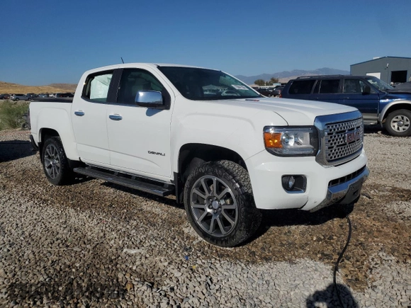 2017 GMC Canyon 4WD Denali with VIN 1GTP6EE11H1291755, listed as a Copart auction lot 70841594 with 89,609 mi miles and Salvage Title. Bid and sale history available at carsss.com. Image 4.