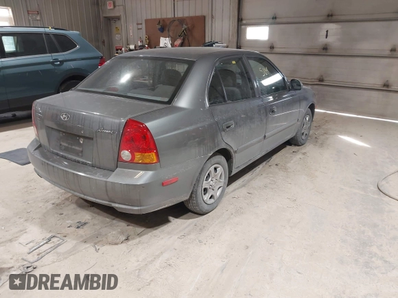 2004 Hyundai Accent GL with VIN KMHCG45C44U528783, listed as a IAAI auction lot 41535104 with 1 mi miles. Bid and sale history available at carsss.com. Image 4.