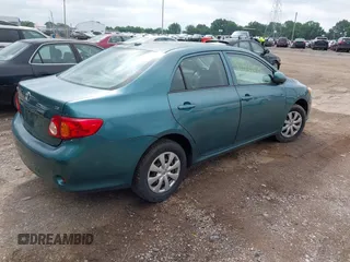 2009 Toyota Corolla z VIN 2T1BU40E39C031746, wystawiony jako IAAI lot #42542079 z przebiegiem 218 019 mil mil oraz . Historia ofert i sprzedaży dostępna na DreamBid. Obrazek 4.