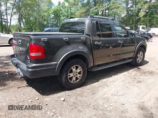 2007 Ford Explorer Sport Trac XLT z VIN 1FMEU31K37UA07311, wystawiony jako IAAI lot #42352365 z przebiegiem 167 282 mil mil oraz . Historia ofert i sprzedaży dostępna na DreamBid. Obrazek 4.