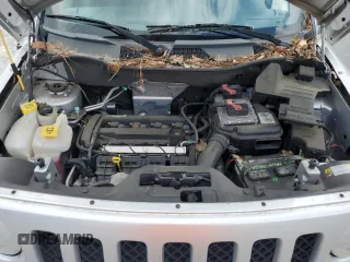 2013 Jeep Patriot Sport z VIN 1C4NJPBA1DD272816, wystawiony jako Copart lot #58267445 z przebiegiem 74 099 mil mil oraz Szkoda całkowita • Salvage title. Historia ofert i sprzedaży dostępna na DreamBid. Obrazek 11.