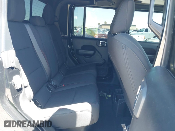 2023 Jeep Gladiator Rubicon z VIN 1C6JJTBG3PL531982, wystawiony jako IAAI lot #42211139 z przebiegiem 28 301 mil mil oraz . Historia ofert i sprzedaży dostępna na DreamBid. Obrazek 8.