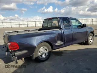 2000 Ford F-150 with VIN 1FTRX07W3YKA56561, listed as a Copart auction lot 81149654 with 185,967 mi miles and Salvage title. Bid and sale history available at DreamBid. Image 3.