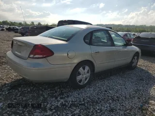2005 Ford Taurus SE with VIN 1FAFP53U95A101336, listed as a Copart auction lot 56457095 with 127,656 mi miles and Salvage title. Bid and sale history available at DreamBid. Image 3.