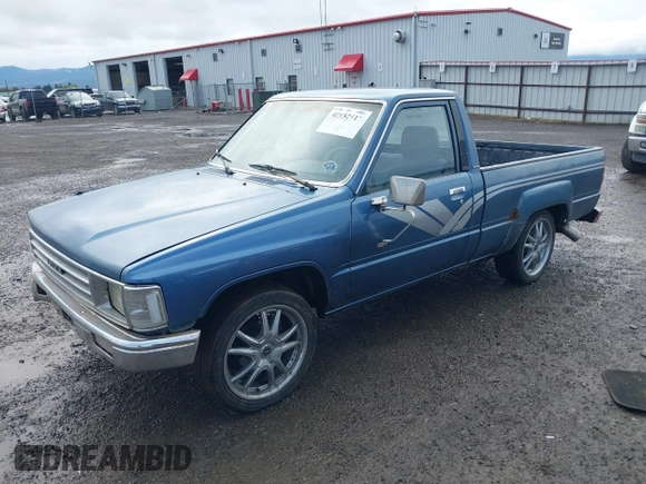 1988 Toyota Pickup with VIN JT4RN50R5J5169942, listed as a IAAI auction lot 42152517 with 218,579 mi miles and . Bid and sale history available at DreamBid. Image 2.