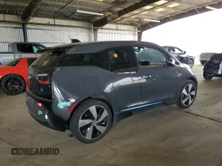 2014 BMW i3 with VIN WBY1Z4C56EV275504, listed as a Copart auction lot 57070015 with Not provided miles and Salvage title. Bid and sale history available at DreamBid. Image 3.