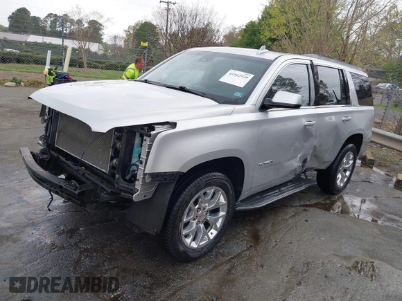 2015 GMC Yukon SLT with VIN 1GKS2BKC0FR676107, listed as a IAAI auction lot 41962929 with 132,389 mi miles. Bid and sale history available at carsss.com. Image 19.