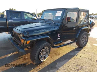 1997 Jeep Wrangler SE with VIN 1J4FY29P0VP415195, listed as a IAAI auction lot 41221078 with 137,046 mi miles. Bid and sale history available at carsss.com. Image 2.