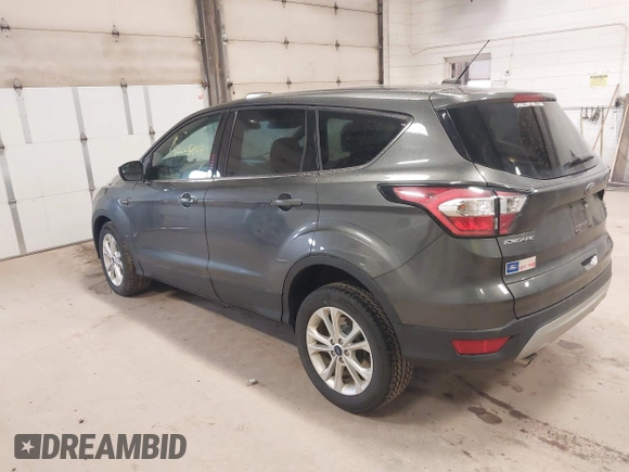 2017 Ford Escape SE with VIN 1FMCU9G90HUC96633, listed as a IAAI auction lot 42005904 with 93,139 mi miles. Bid and sale history available at carsss.com. Image 3.