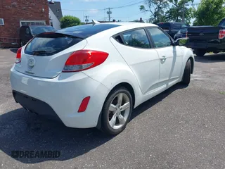 2013 Hyundai Veloster RE:MIX with VIN KMHTC6AD4DU173426, listed as a IAAI auction lot 42551270 with 91,560 mi miles and . Bid and sale history available at DreamBid. Image 4.