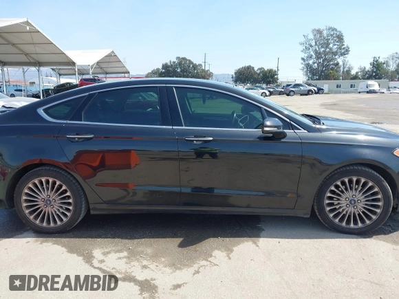 2015 Ford Fusion Titanium with VIN 3FA6P0K91FR168665, listed as a IAAI auction lot 41852403 with 138,711 mi miles. Bid and sale history available at carsss.com. Image 13.