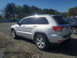 2011 Jeep Grand Cherokee Laredo with VIN 1J4RR4GG1BC714058, listed as a Copart auction lot 54974435 with 201,329 mi miles and Clean Title. Bid and sale history available at carsss.com. Image 2.